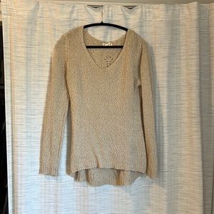 Beige sweater with patterned back